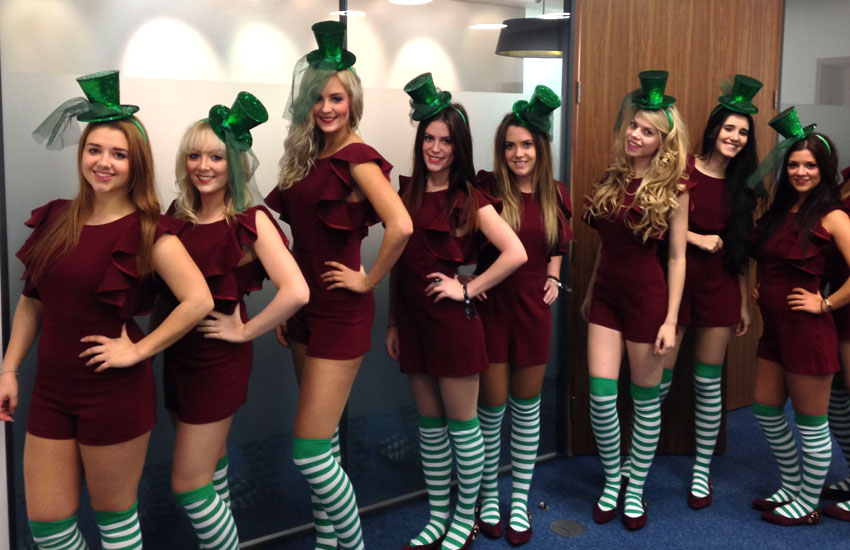 Hire Christmas elves and Santa's helpers.