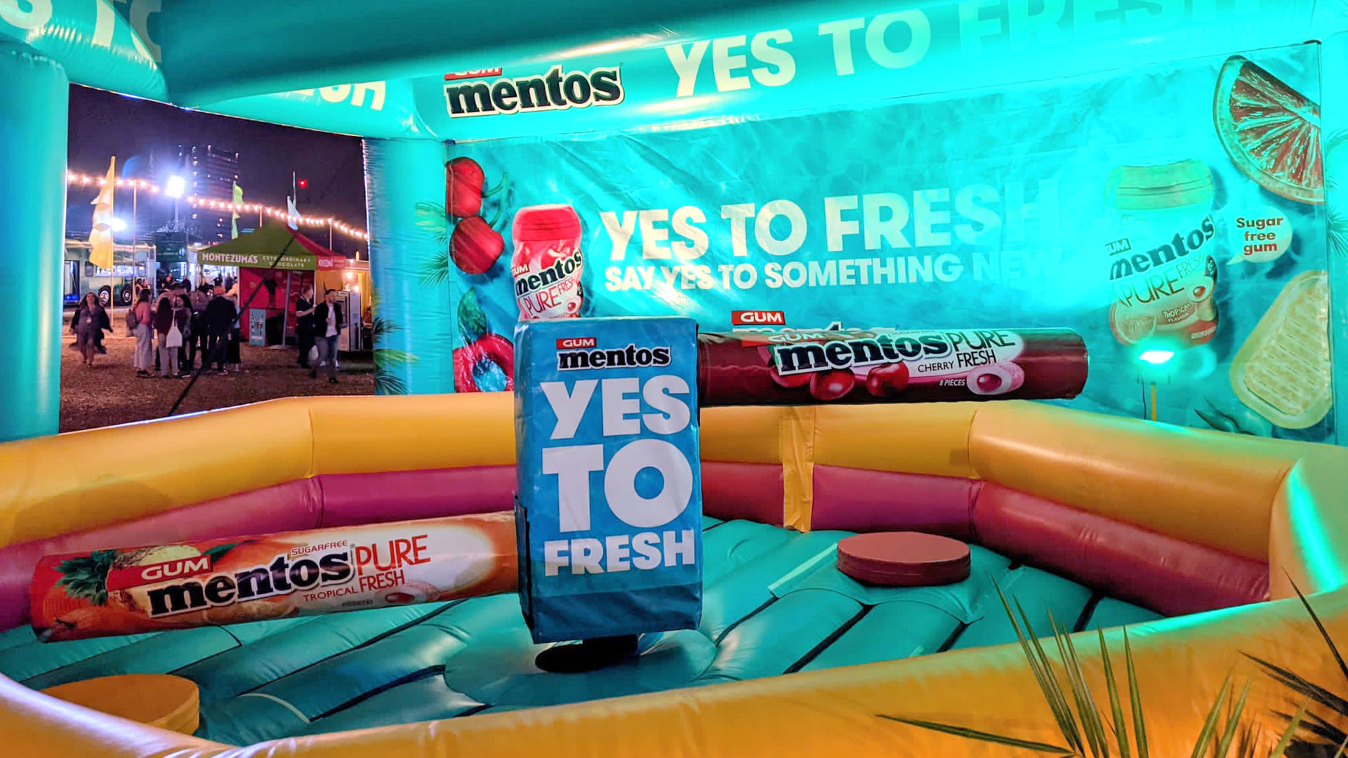 Inside the Mentos ‘Yes To Fresh’ inflatable installation at Barcode Festival featuring oversized gum props and branding