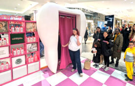 Big queues of customers in line for the Euthymol Tooth Booth at Westfield London