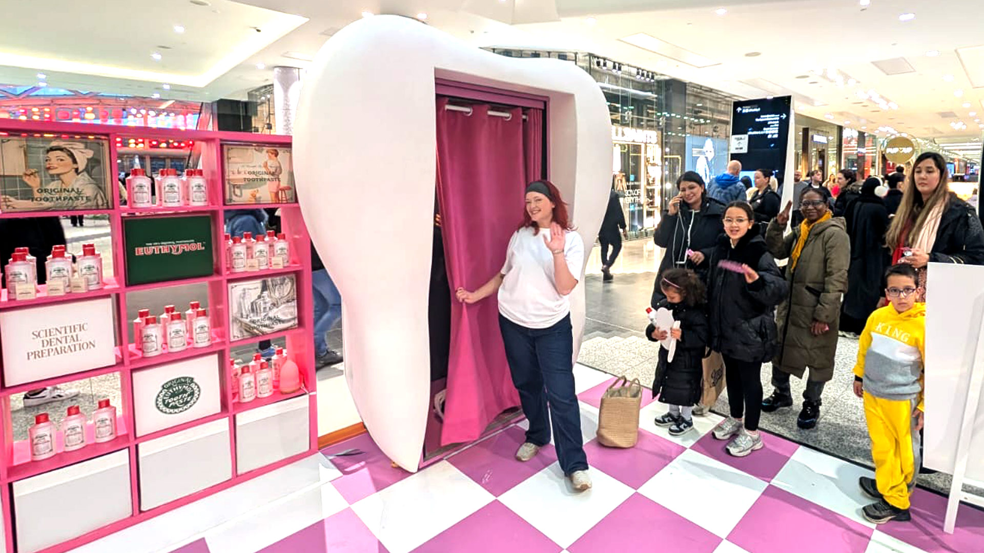 Big queues of customers in line for the Euthymol Tooth Booth at Westfield London