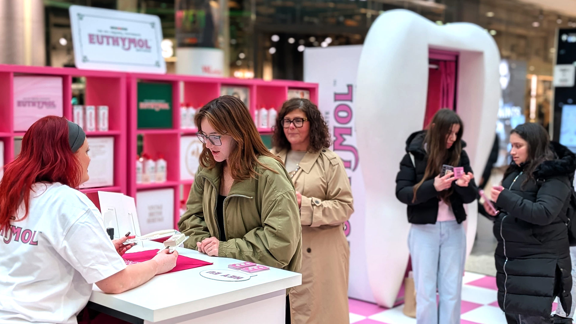 Sampling to consumers at the Euthymol sampling pop up in Westfield London