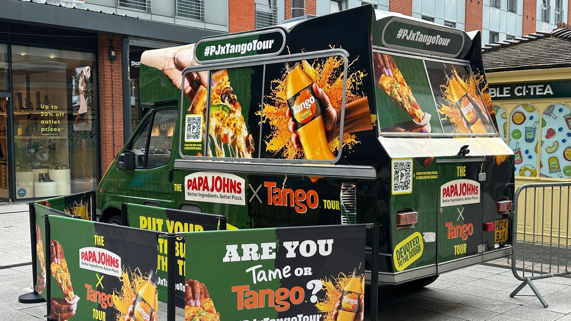 Close-up of Papa Johns x Tango branded ice cream van used for student sampling across UK university campuses