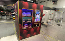Custom-built vending machine activation featuring branded product display and interactive sampling