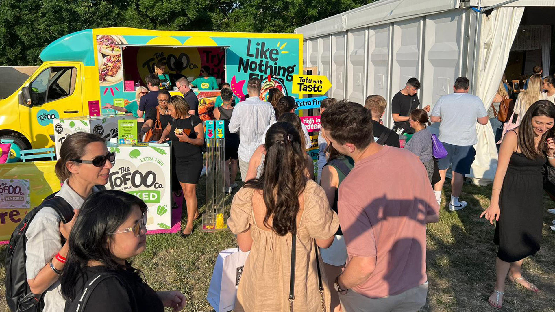 Product demonstration during a live sampling campaign to encourage consumer trial