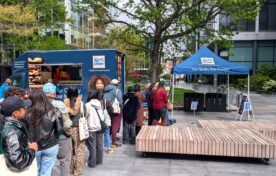 Queue of people waiting for free Ritter Sport samples