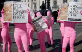Butt cramps PR stunt joke newspaper and pink morph suits
