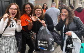 Happy shoppers receiving Mcvities Club Layers free samples
