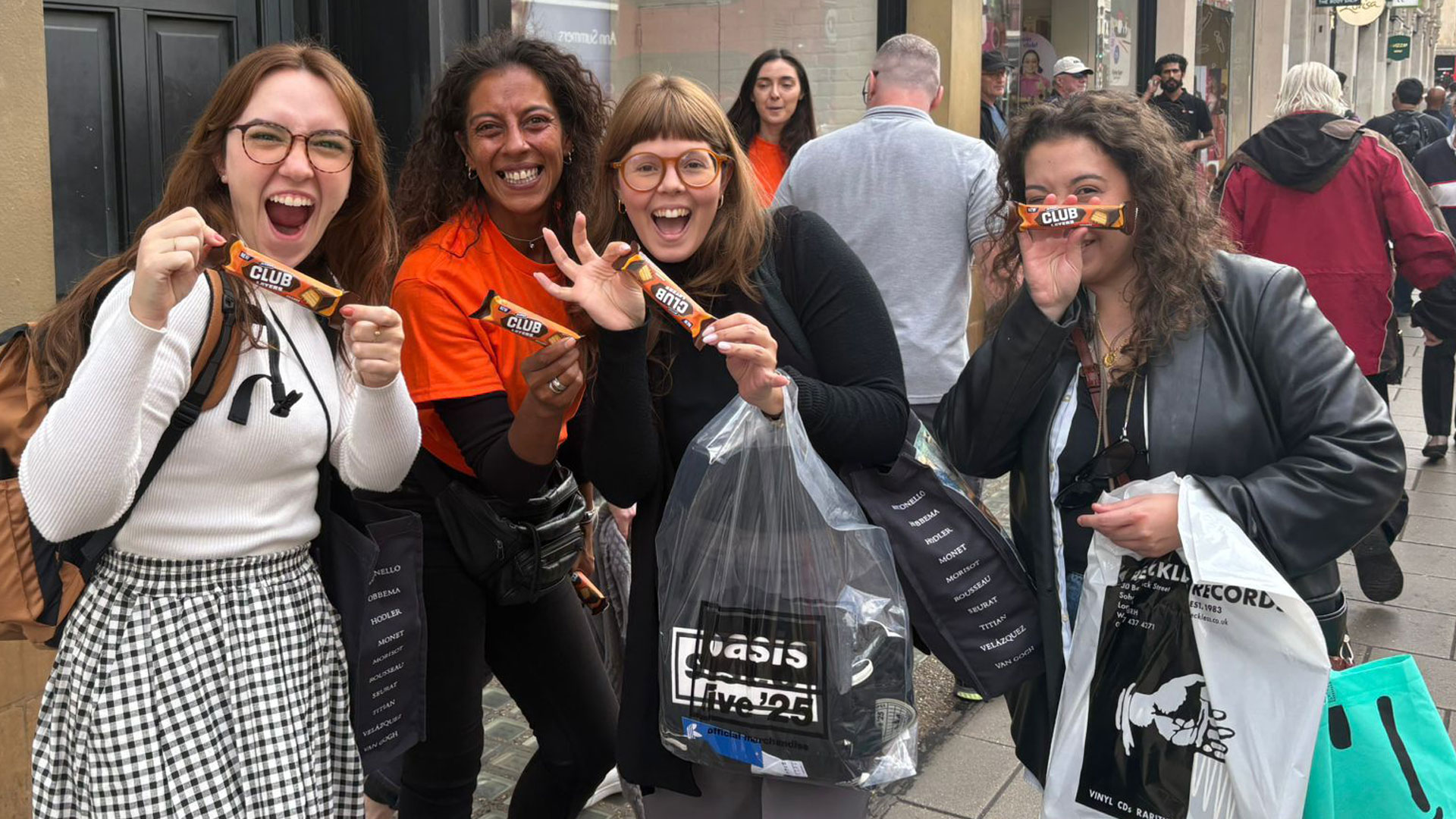 Happy shoppers receiving Mcvities Club Layers free samples