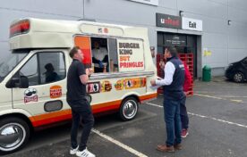 Pringles x Burger King branded ice cream van outside wholesale depot sampling